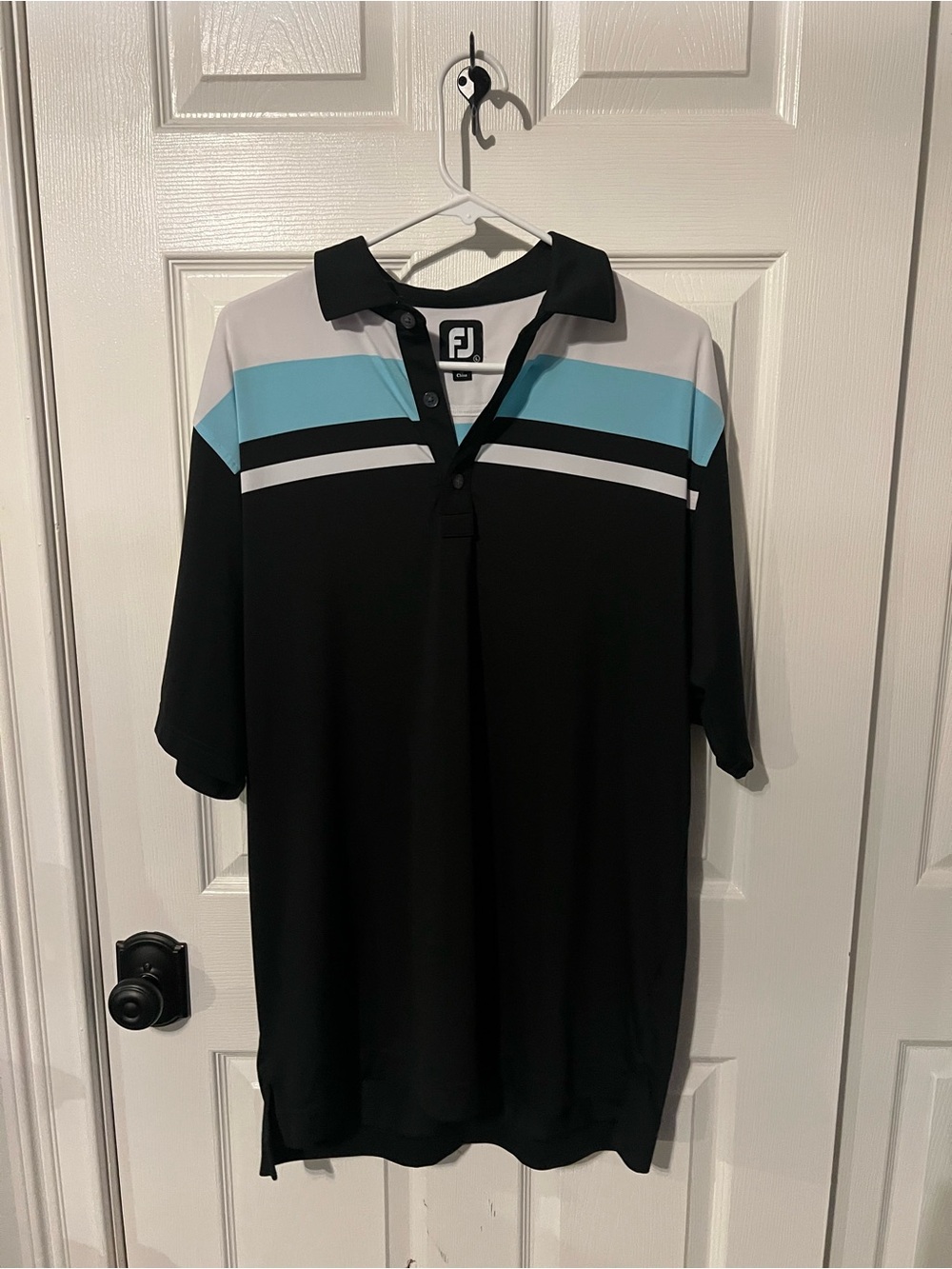 FootJoy Black Polo with White and Light Blue Chest Stripes